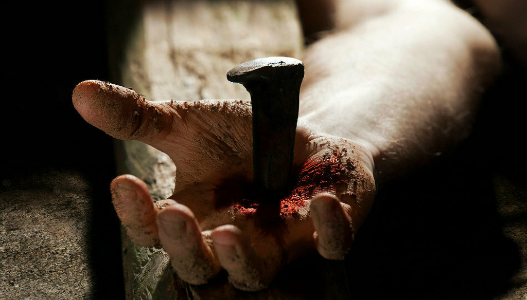 Nailed Hand of Jesus On The Cross